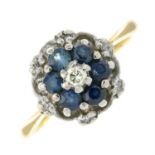 A sapphire and diamond cluster ring.