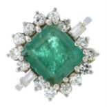 An emerald and vari-shape diamond cluster ring.