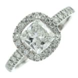 A square-shape diamond and brilliant-cut cluster ring, with pave-set diamond sides.