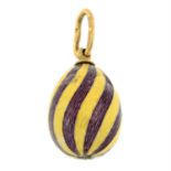 A mid 20th century 14ct Gold Russian yellow and purple guilloche enamel egg pendant.