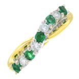 An 18ct gold emerald and diamond nine-stone ring.