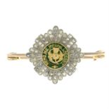 An early to mid 20th century rose-cut diamond and green enamel Order of the Thistle brooch.