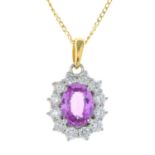 An 18ct gold pink sapphire and diamond cluster pendant, with chain.