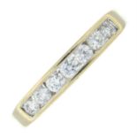 An 18ct gold brilliant-cut diamond half eternity ring.