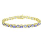 A tanzanite and diamond bracelet.