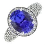 An 18ct gold tanzanite and brilliant-cut diamond ring.