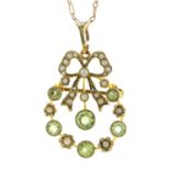 An Edwardian 9ct gold split pearl and peridot pendant, with bow and floral motifs, with chain.