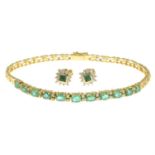 An emerald and colourless gem bracelet and a pair of matching earrings.