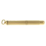 A 9ct gold retractable toothpick.