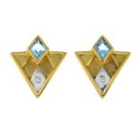 A pair of 9ct gold topaz and brilliant-cut diamond bi-colour earrings.