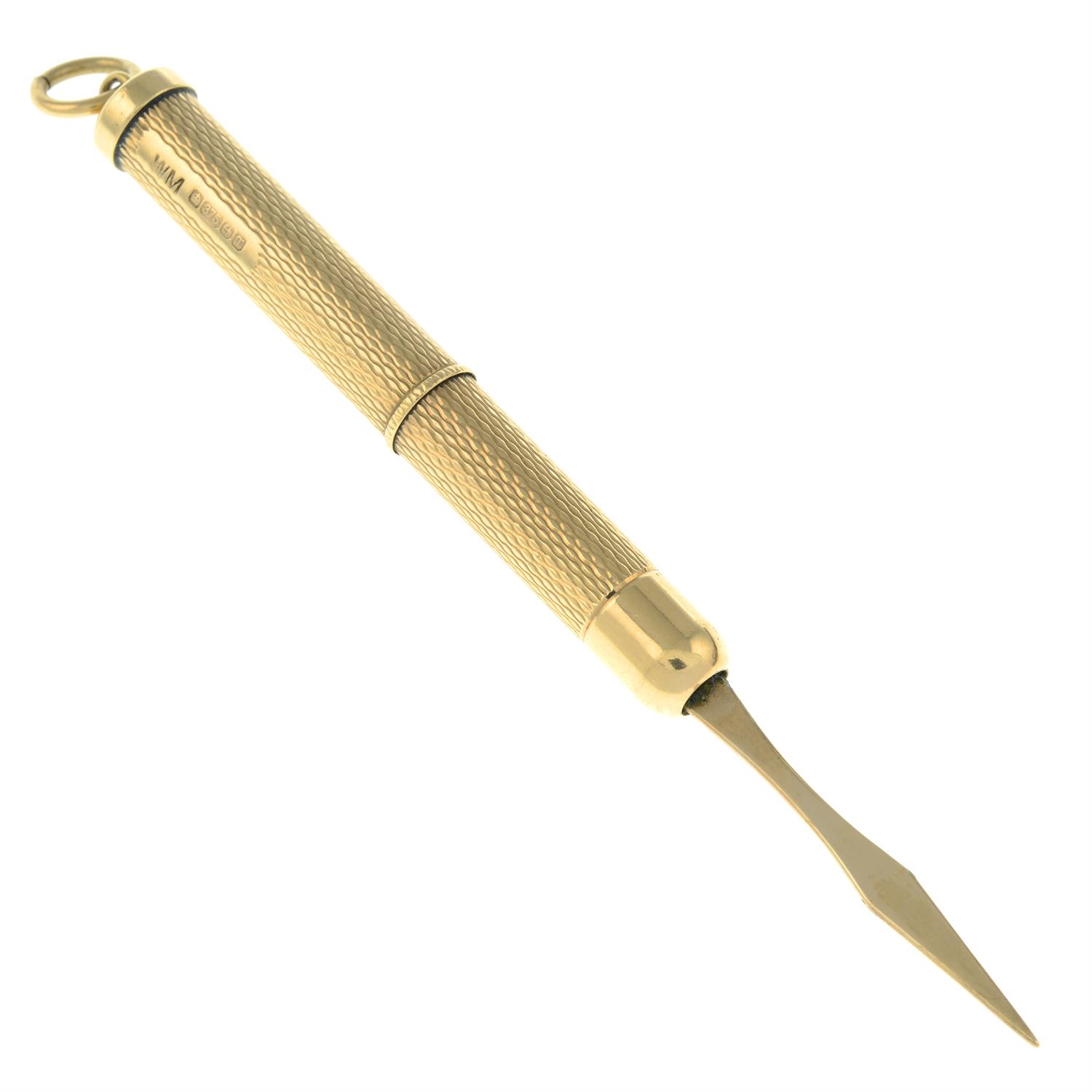 A 9ct gold retractable toothpick. - Image 2 of 2