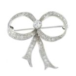 A vari-cut diamond bow brooch.