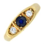 A 9ct gold sapphire and diamond three-stone ring.