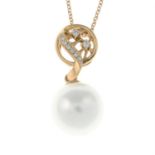 An 18ct gold cultured pearl and diamond pendant, with 18ct gold trace-link chain.