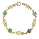 A fancy-link bracelet, with turquoise spacers.