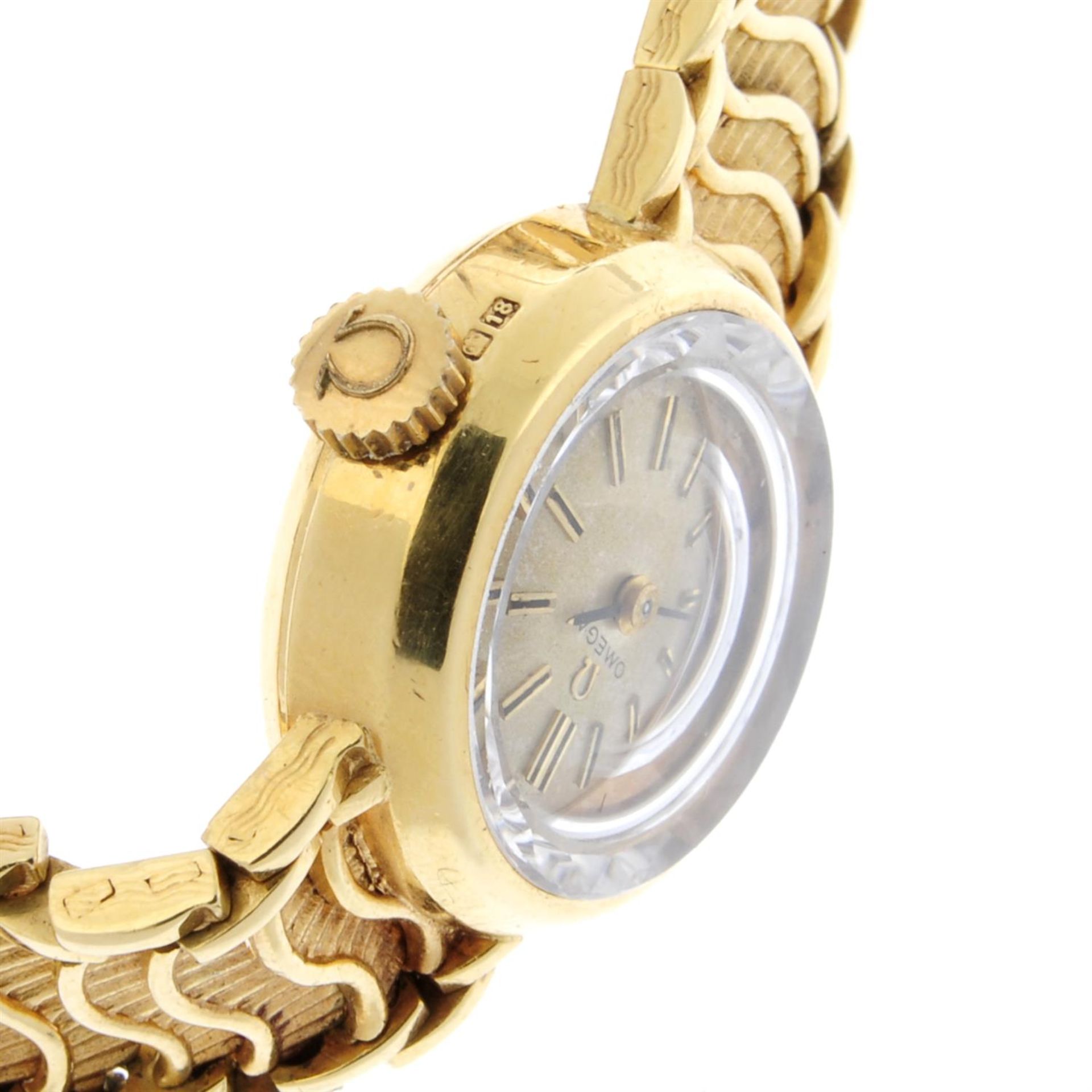 OMEGA - an 18ct yellow gold bracelet watch, 17mm. - Image 3 of 5