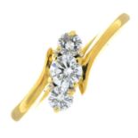 An 18ct gold brilliant-cut diamond three-stone crossover ring.