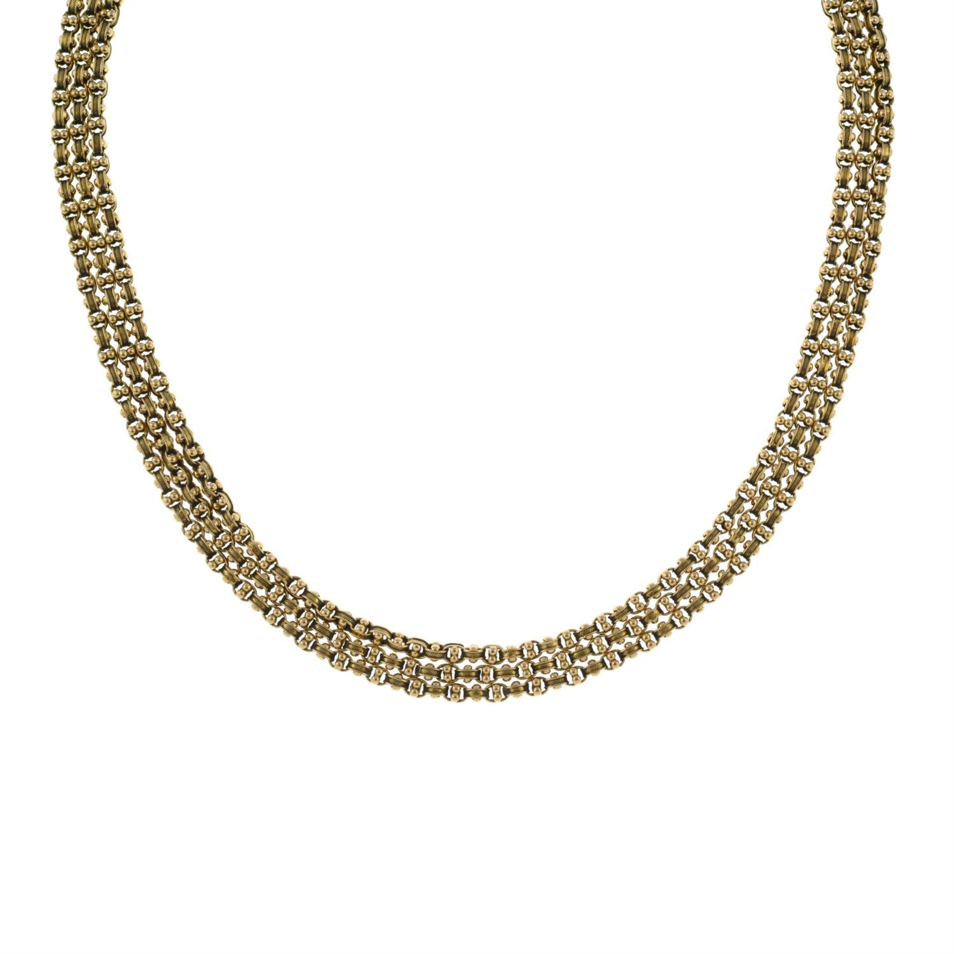 A Victorian three-row fancy-link necklace.