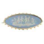 A blue jasperware Wedgwood brooch.