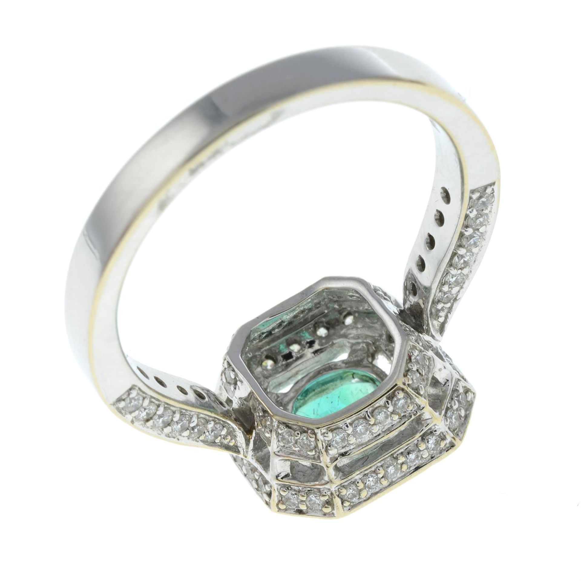 An 18ct gold emerald and brilliant-cut diamond cluster ring, with pavé-set diamond shoulders. - Image 3 of 3