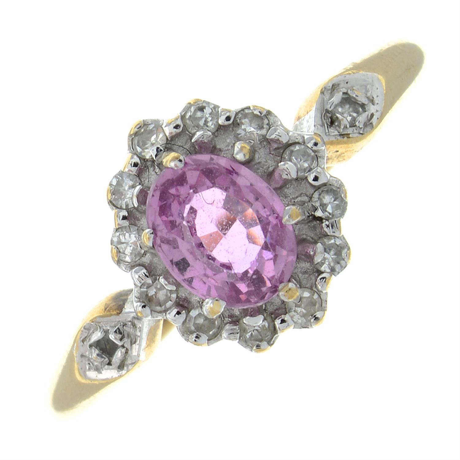 A 9ct gold pink sapphire and single-cut diamond cluster ring.