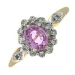 A 9ct gold pink sapphire and single-cut diamond cluster ring.