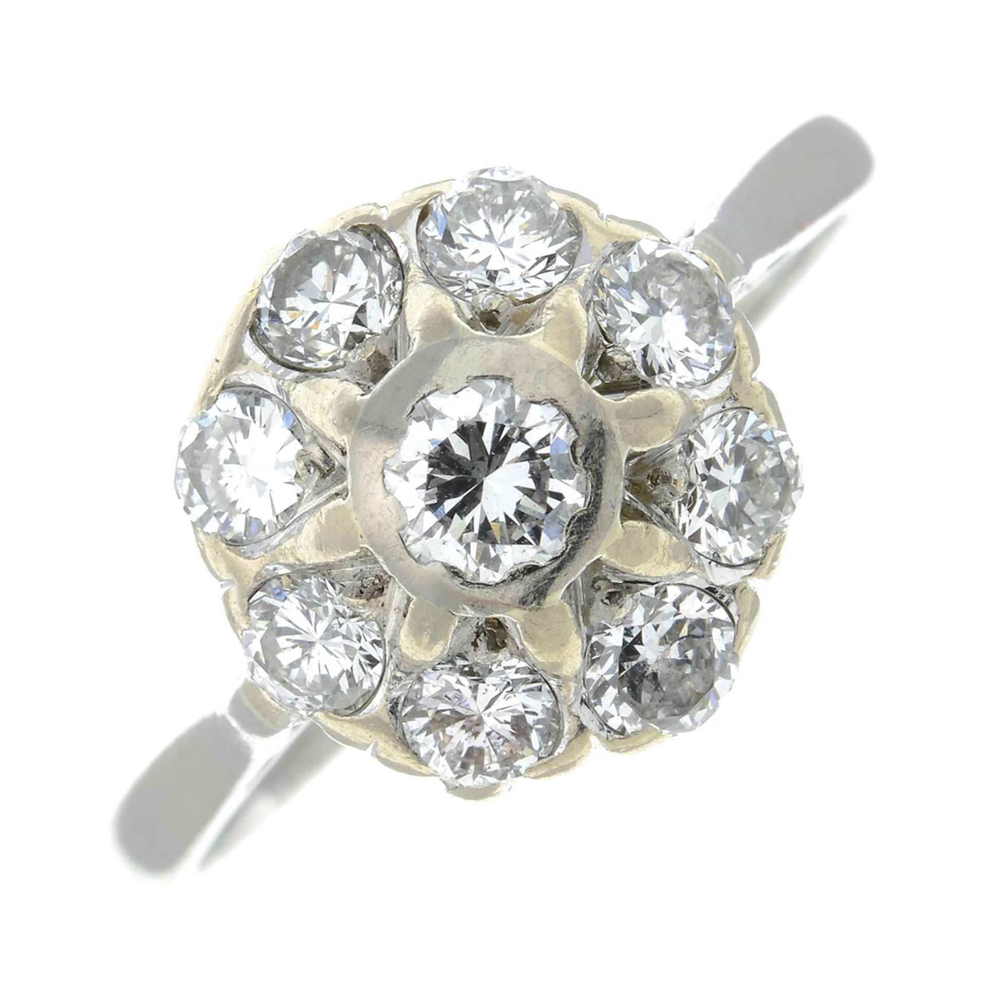 An 18ct gold brilliant-cut diamond cluster ring.