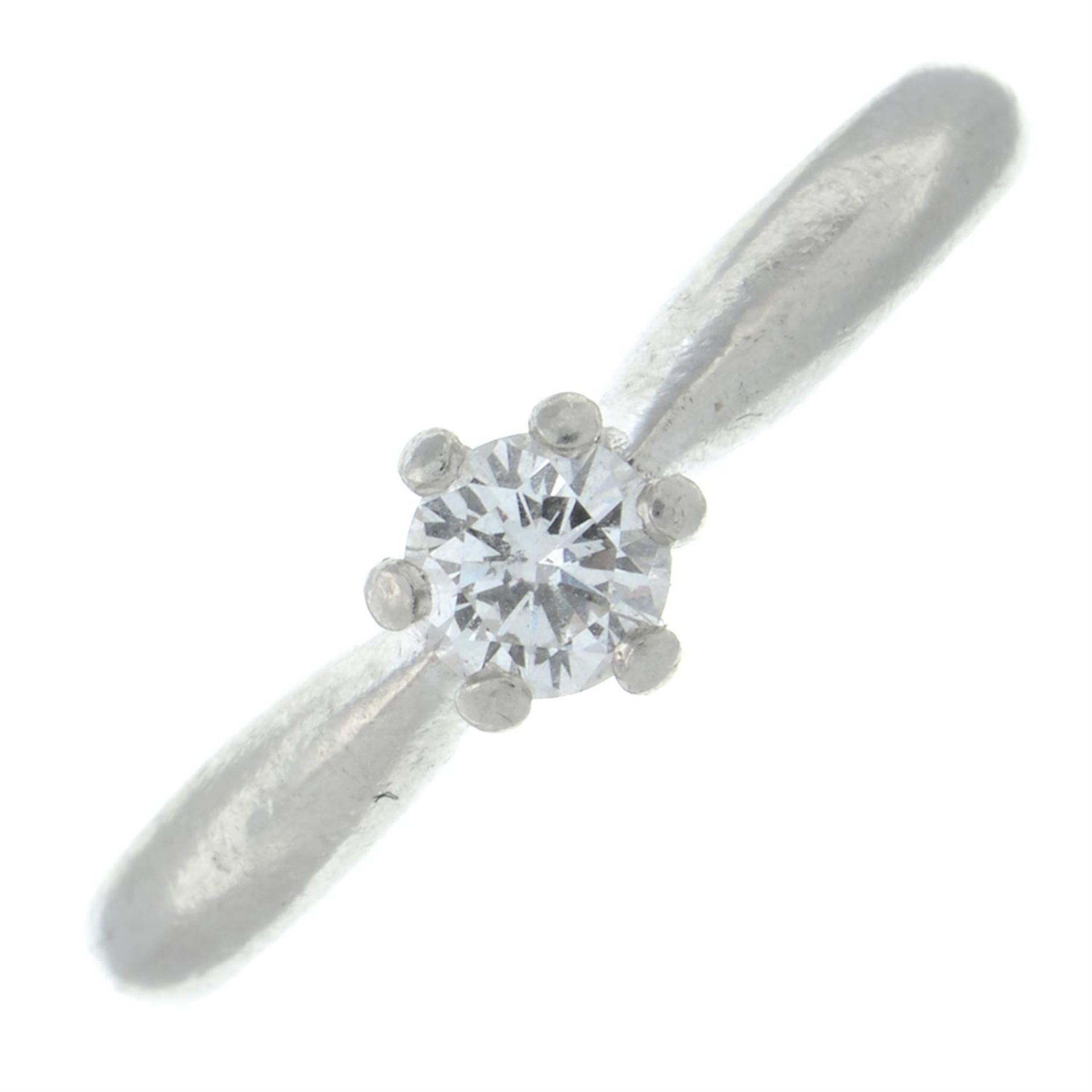 A platinum brilliant-cut diamond single-stone ring.