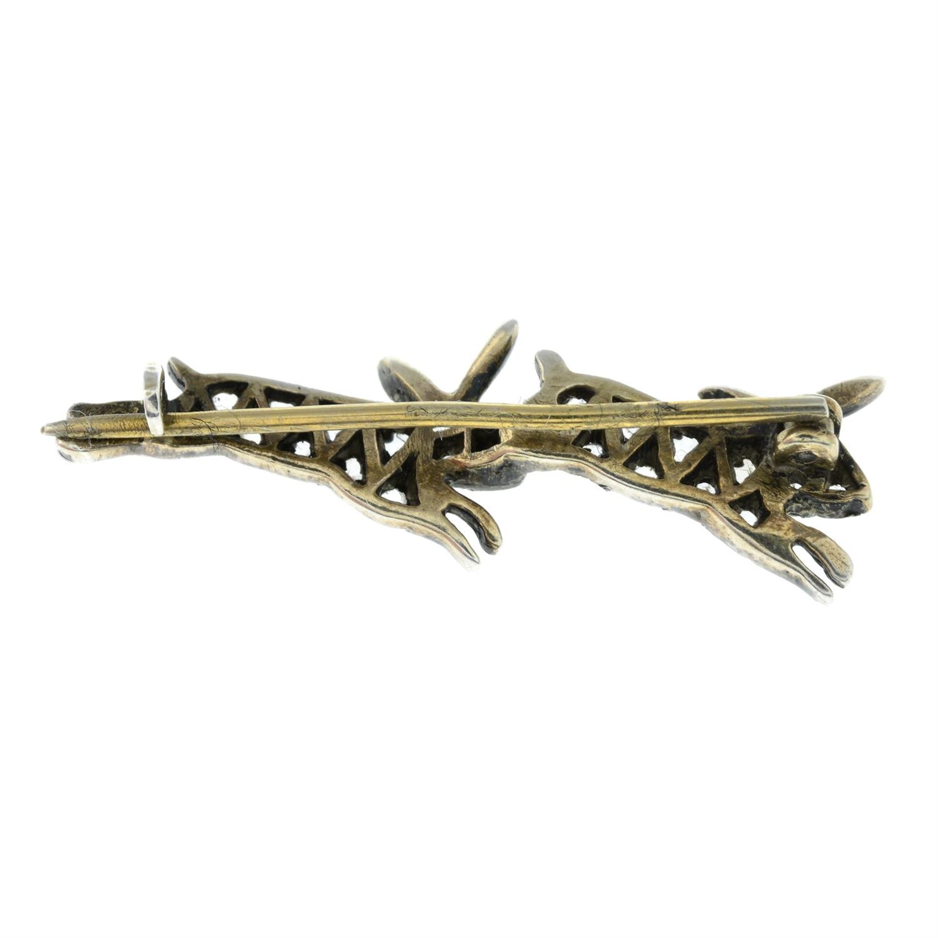 A late Victorian silver and gold rose-cut diamond and ruby leaping rabbits brooch. - Image 2 of 2