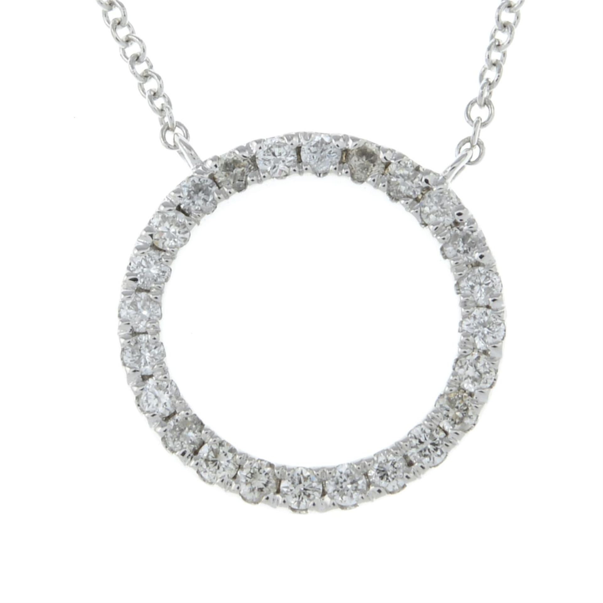 An 18ct brilliant-cut diamond circle pendant, with integral chain.