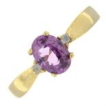 A 9ct gold pink sapphire and brilliant-cut diamond ring.