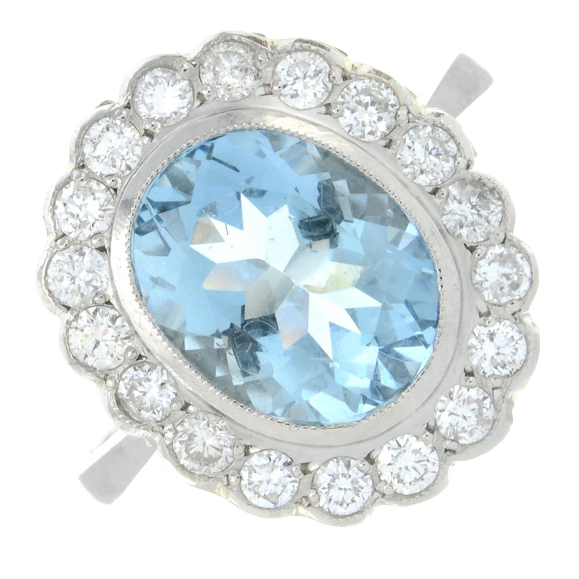 An aquamarine and brilliant-cut diamond cluster ring.