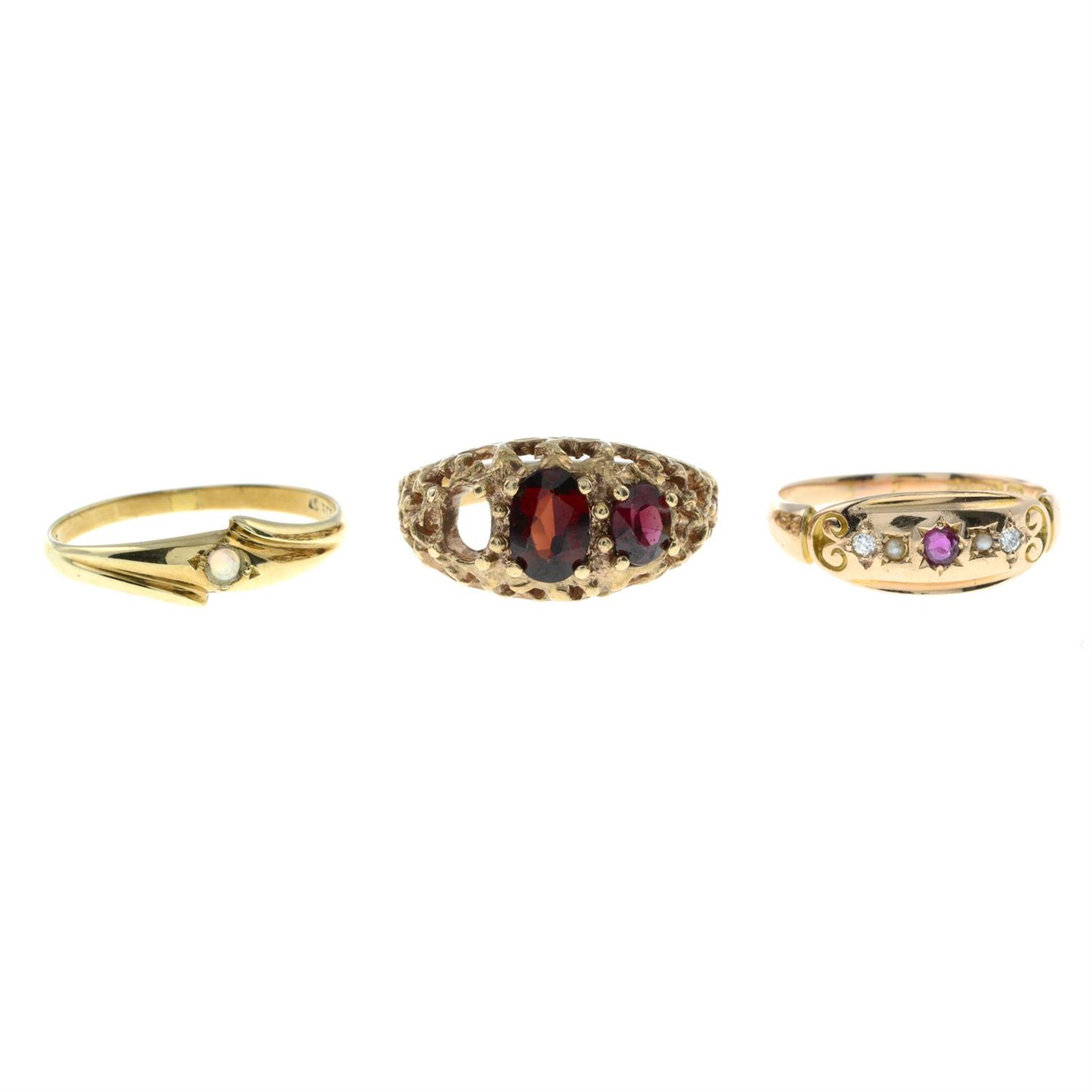 An early 20th century 15ct gold multi-gem ring, together with two later gem-set rings.