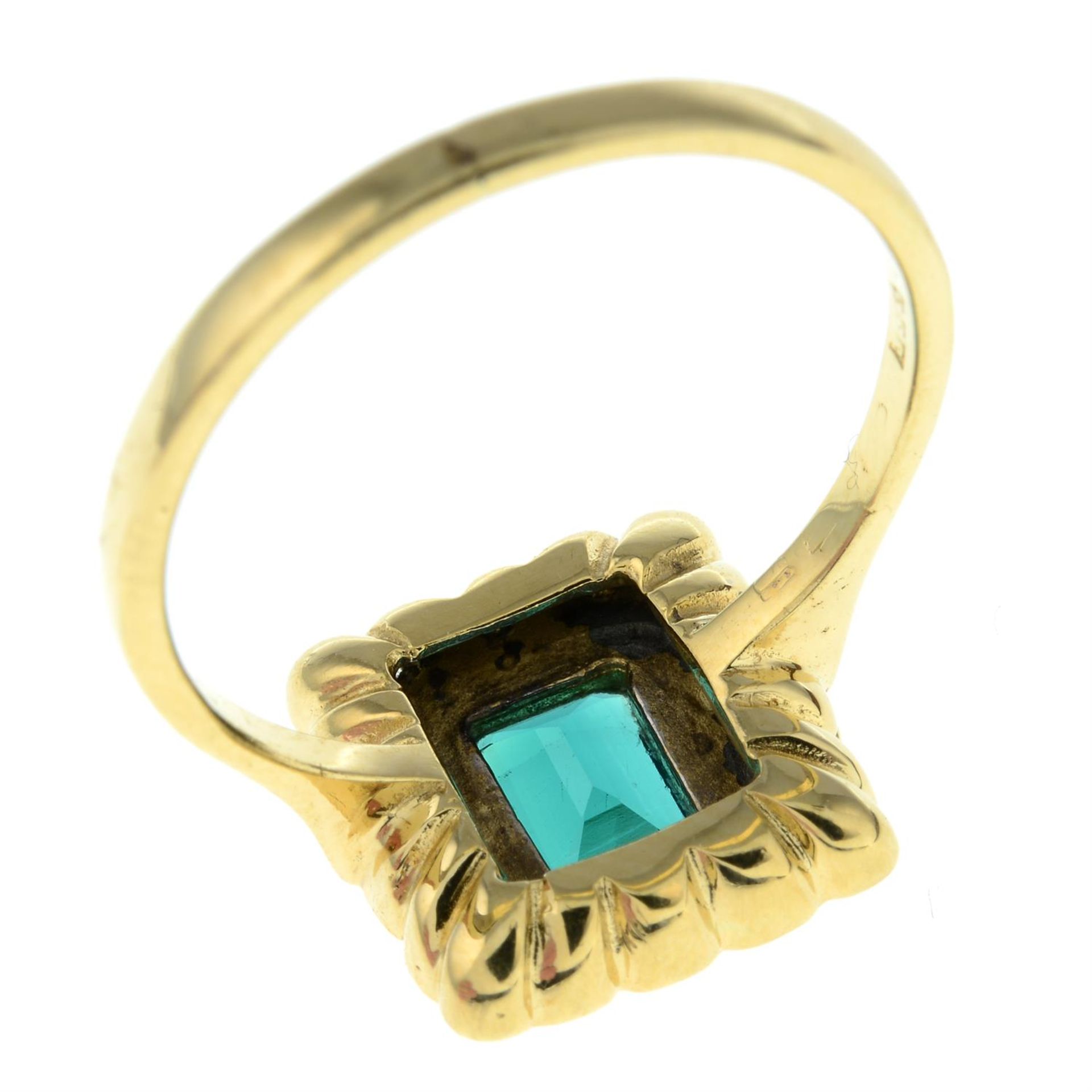 An 18ct gold brilliant-cut diamond and synthetic emerald cluster ring. - Image 2 of 2