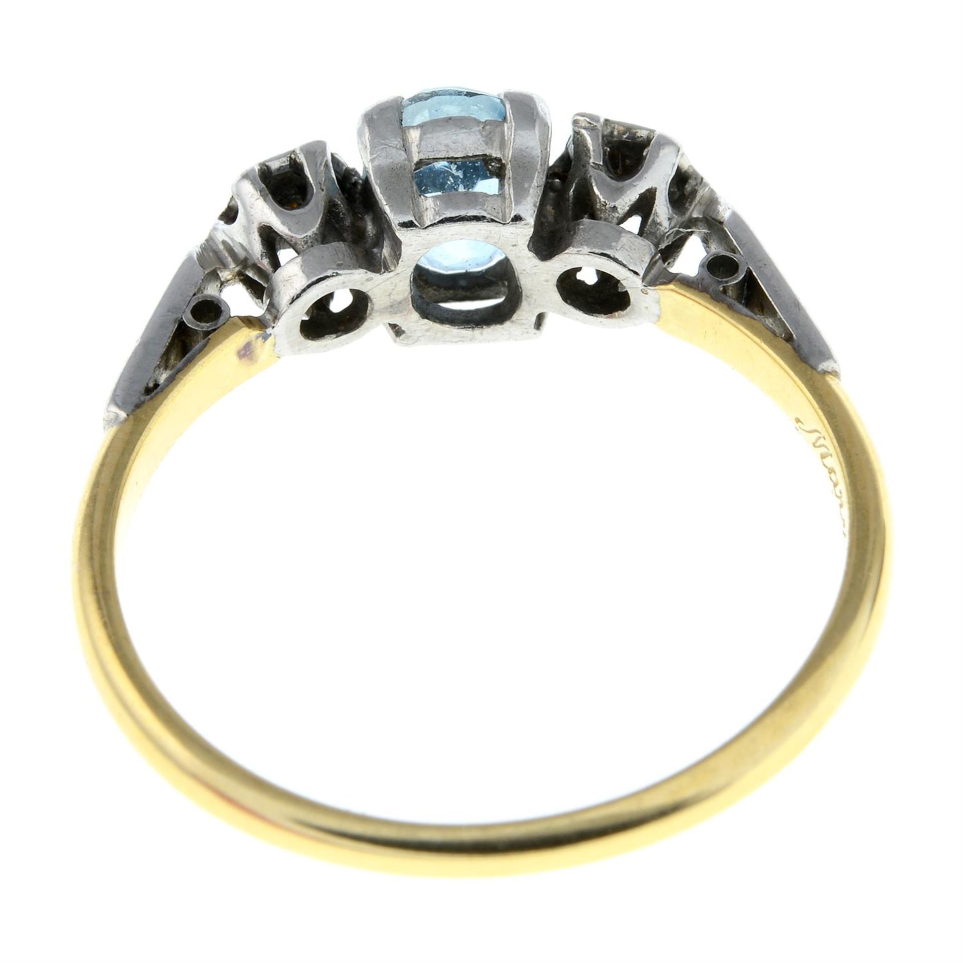 A mid 20th century 18ct gold and platinum old-cut diamond and aquamarine three-stone ring. - Image 2 of 2