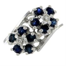 A sapphire and single-cut diamond double cluster crossover ring.