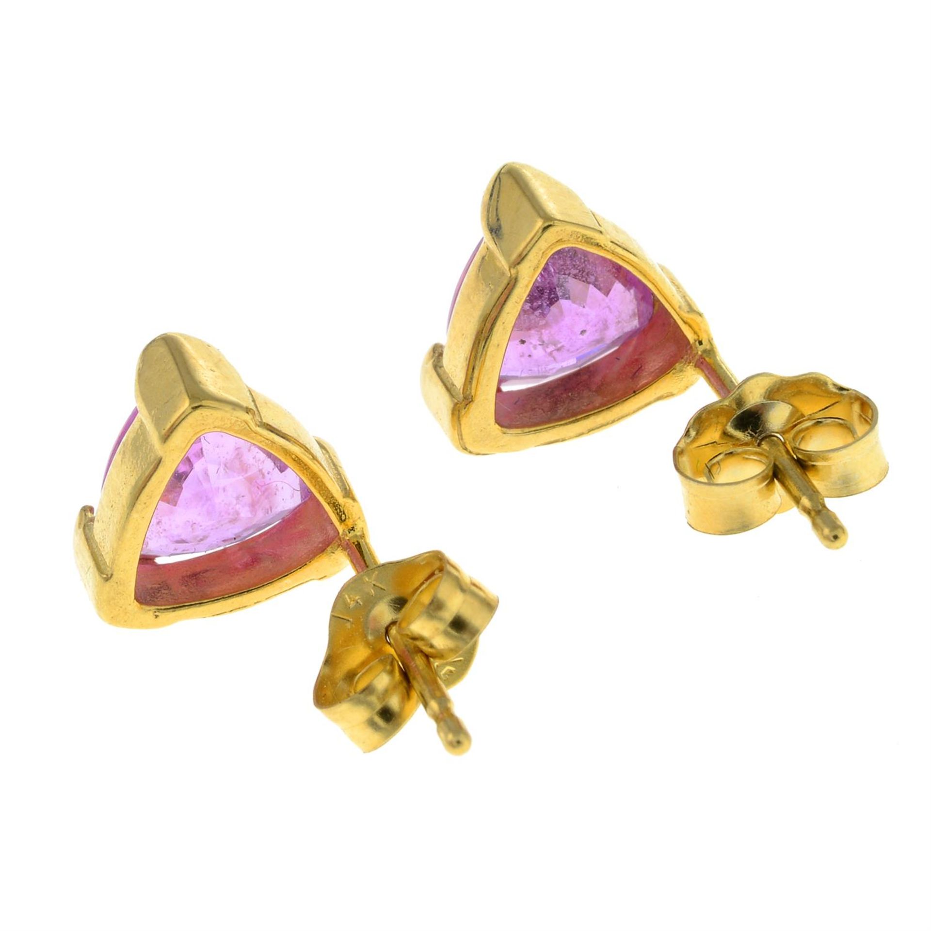 A pair of pink sapphire single-stone stud earrings. - Image 2 of 4