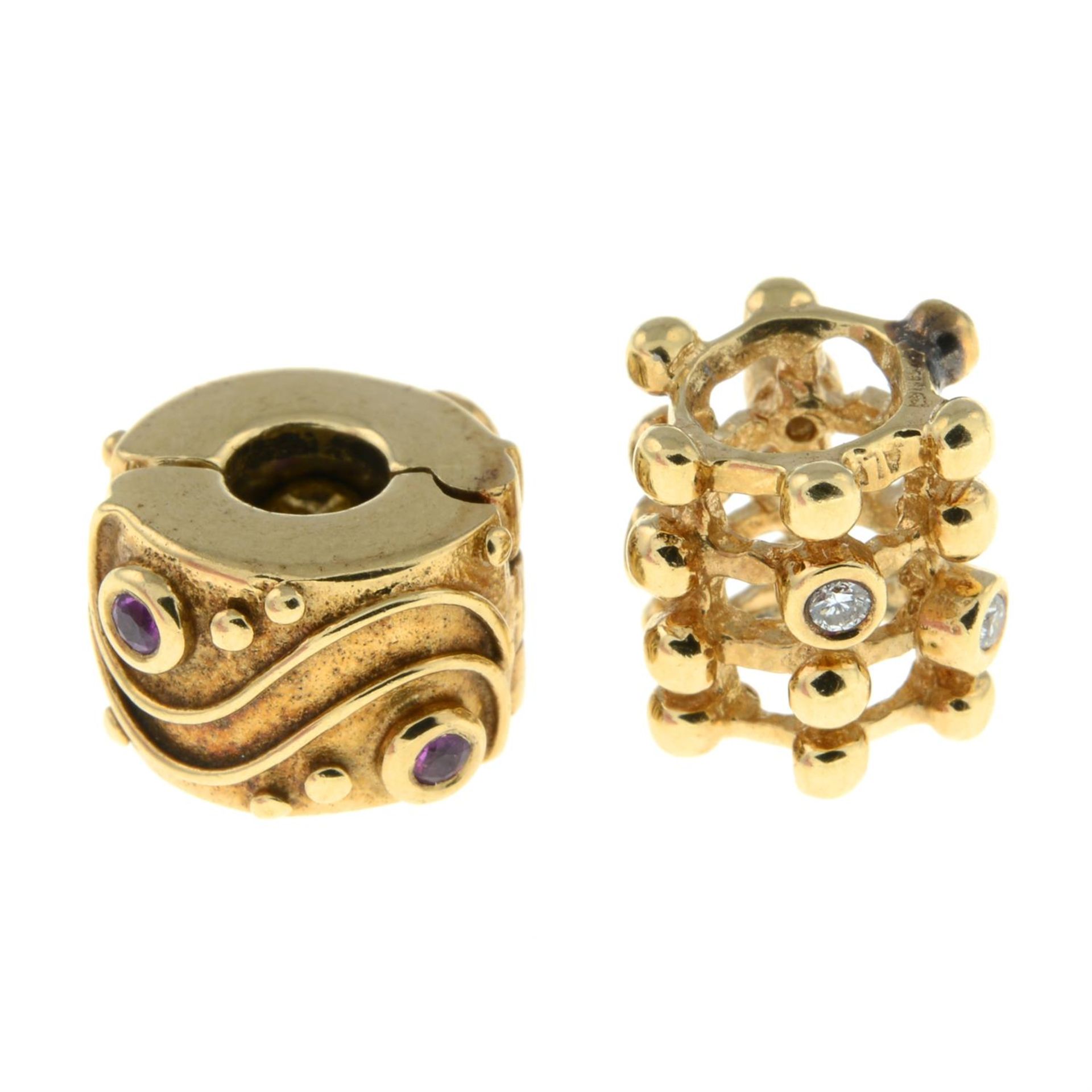 Two 14ct gold gem-set charms.