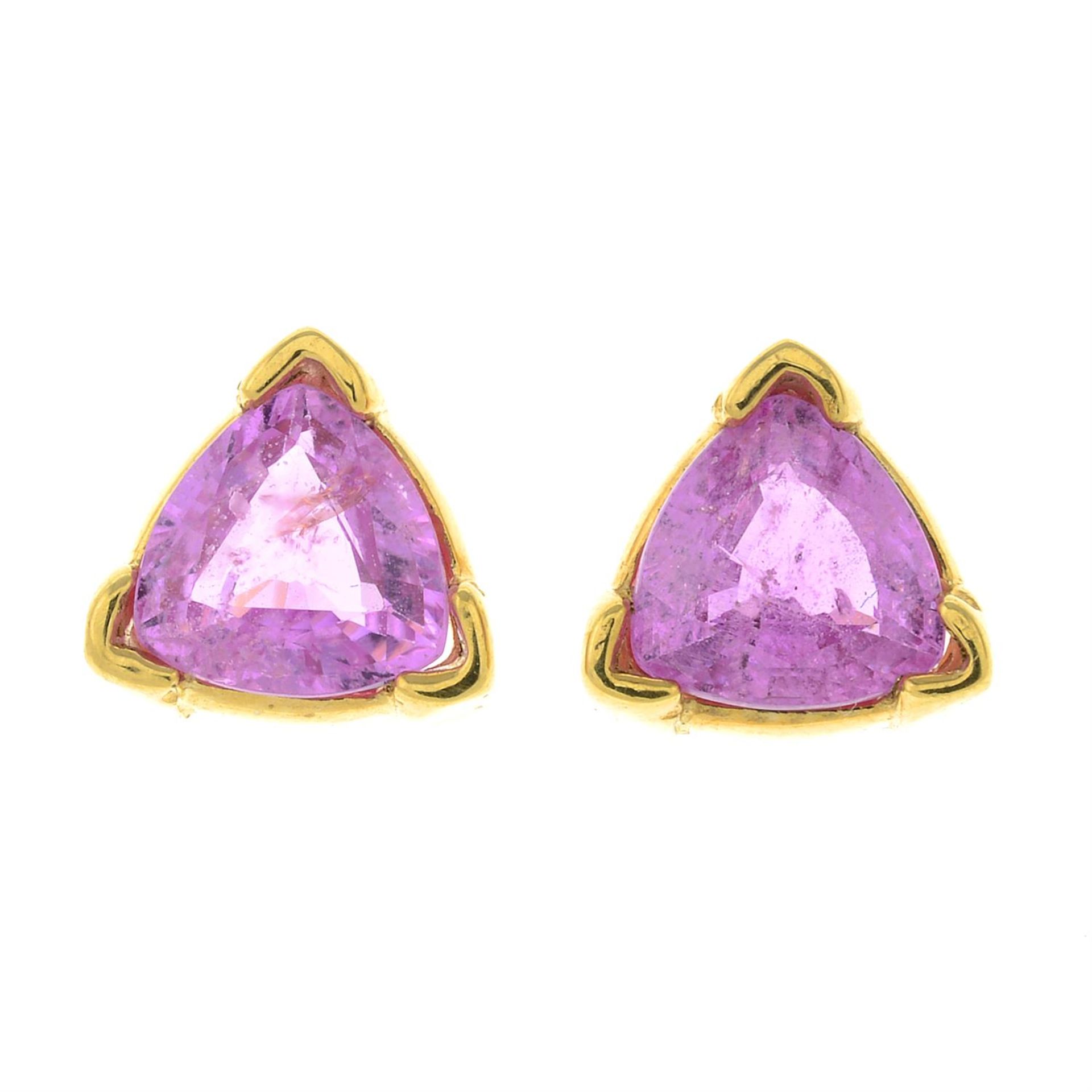 A pair of pink sapphire single-stone stud earrings.