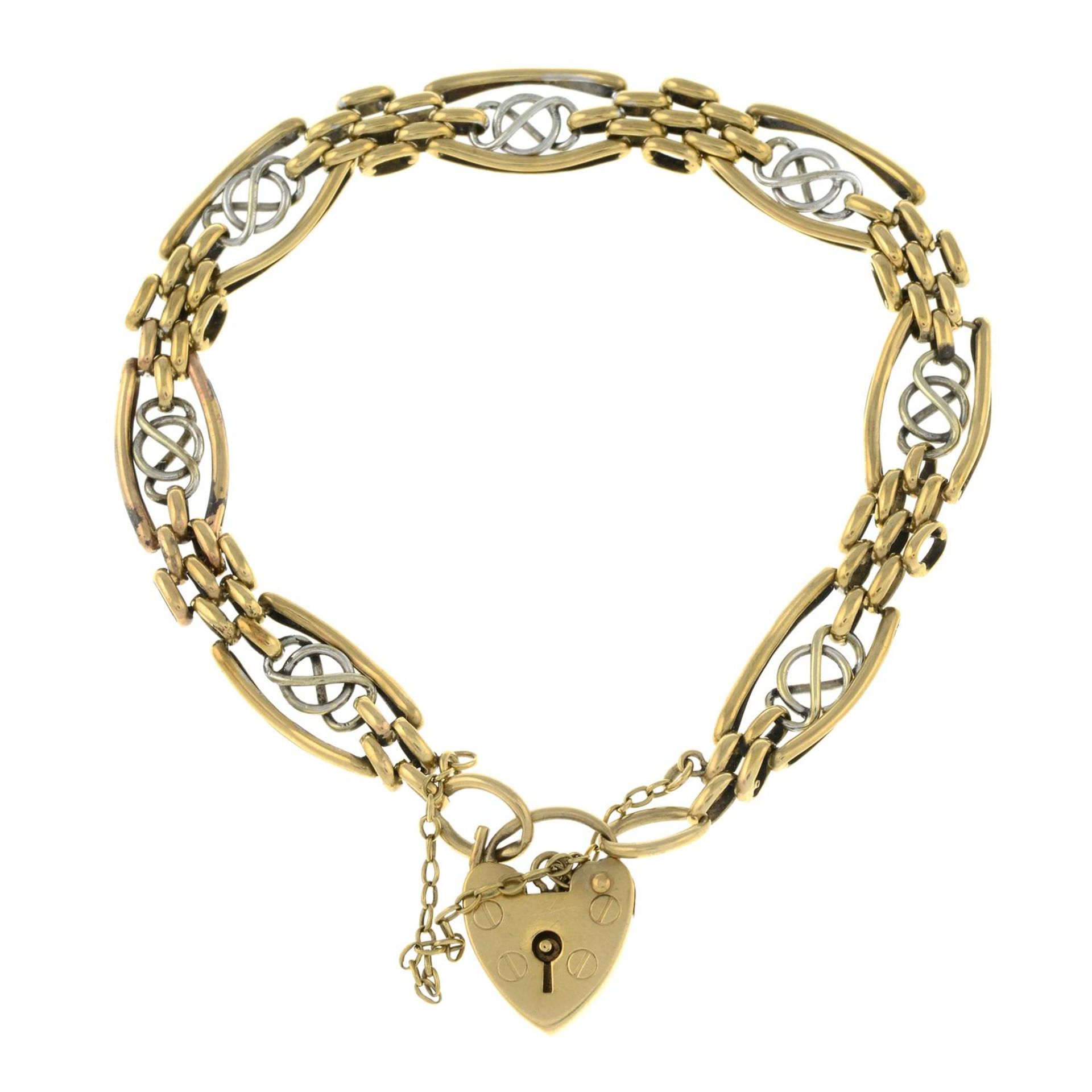 A 9ct bi-colour gold fancy-link charm bracelet, with heart-shaped padlock clasp.