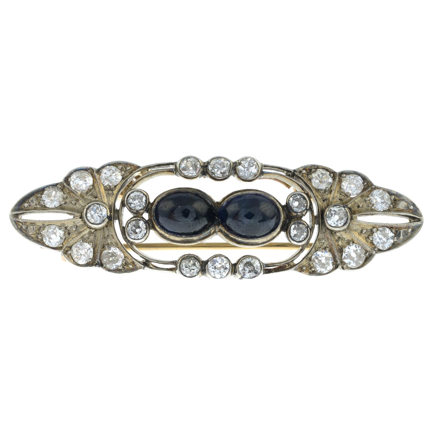 A mid 20th century silver and gold sapphire cabochon and old-cut diamond brooch.