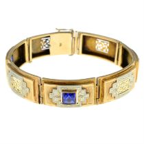 An early 20th century 9ct gold synthetic sapphire bi-colour bracelet.