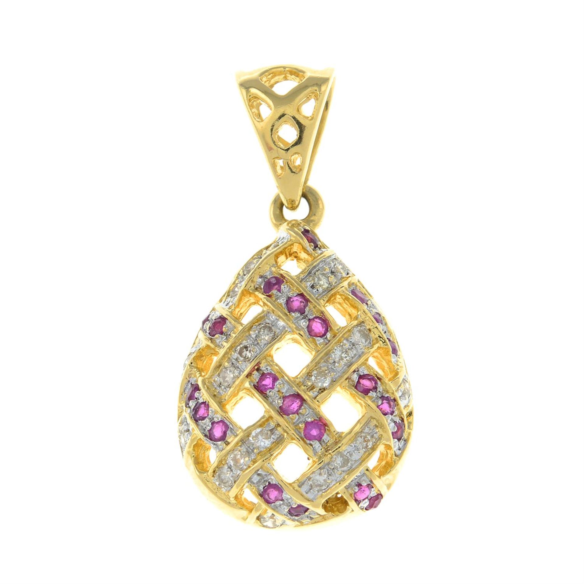 A 18ct gold ruby and single-cut diamond pendant.