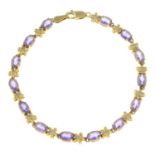 An amethyst and single-cut diamond floral bracelet.