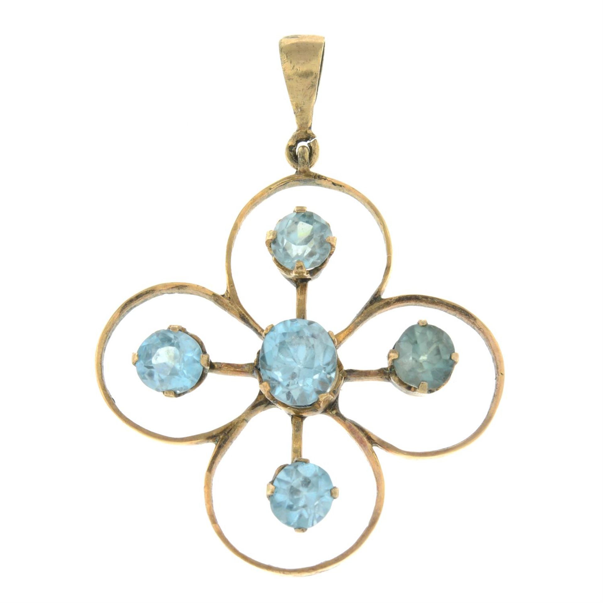 An early 20th century gold blue zircon floral openwork pendant.