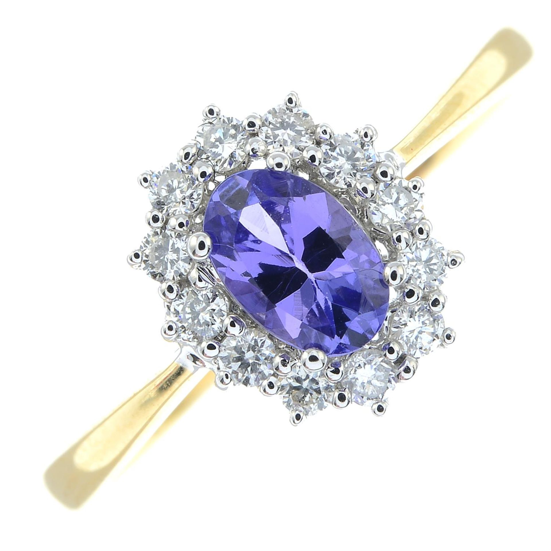 An 18ct gold tanzanite and diamond cluster ring.