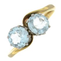 An early 20th century 9ct gold and palladium aquamarine two-stone ring.