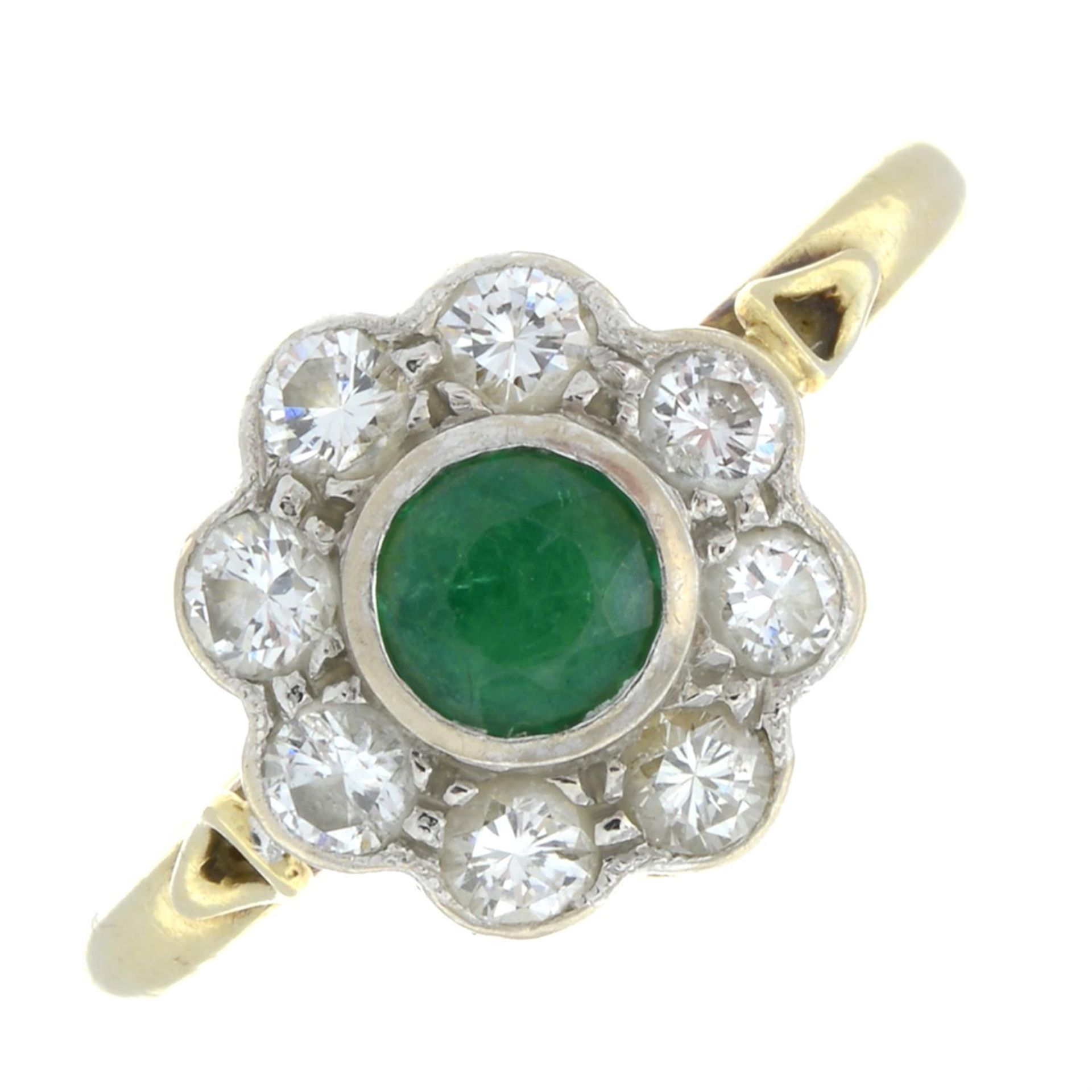 An 18ct gold emerald and brilliant-cut diamond floral cluster ring.