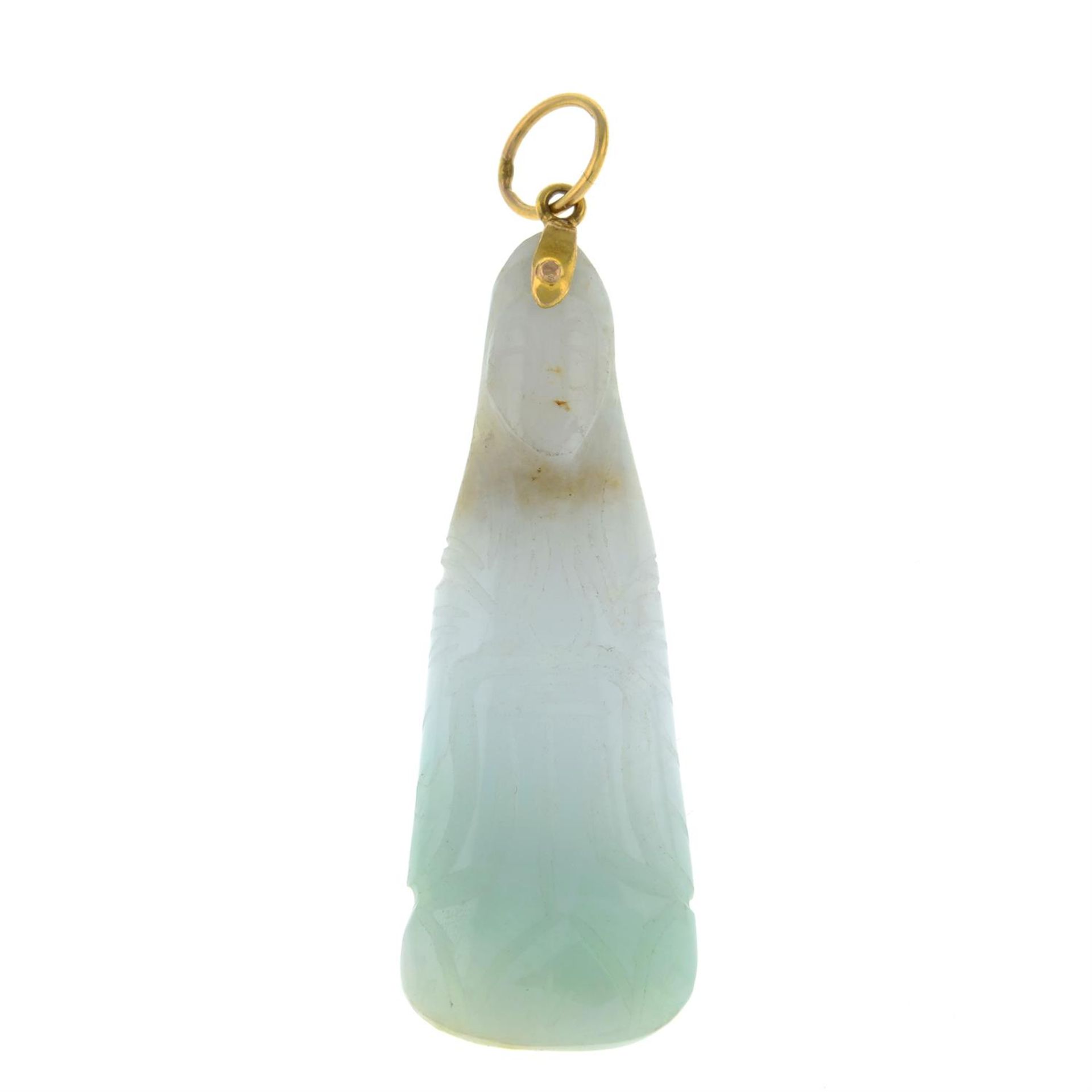 A carved jade pendant.