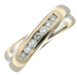 An 18ct gold brilliant-cut diamond crossover band ring.